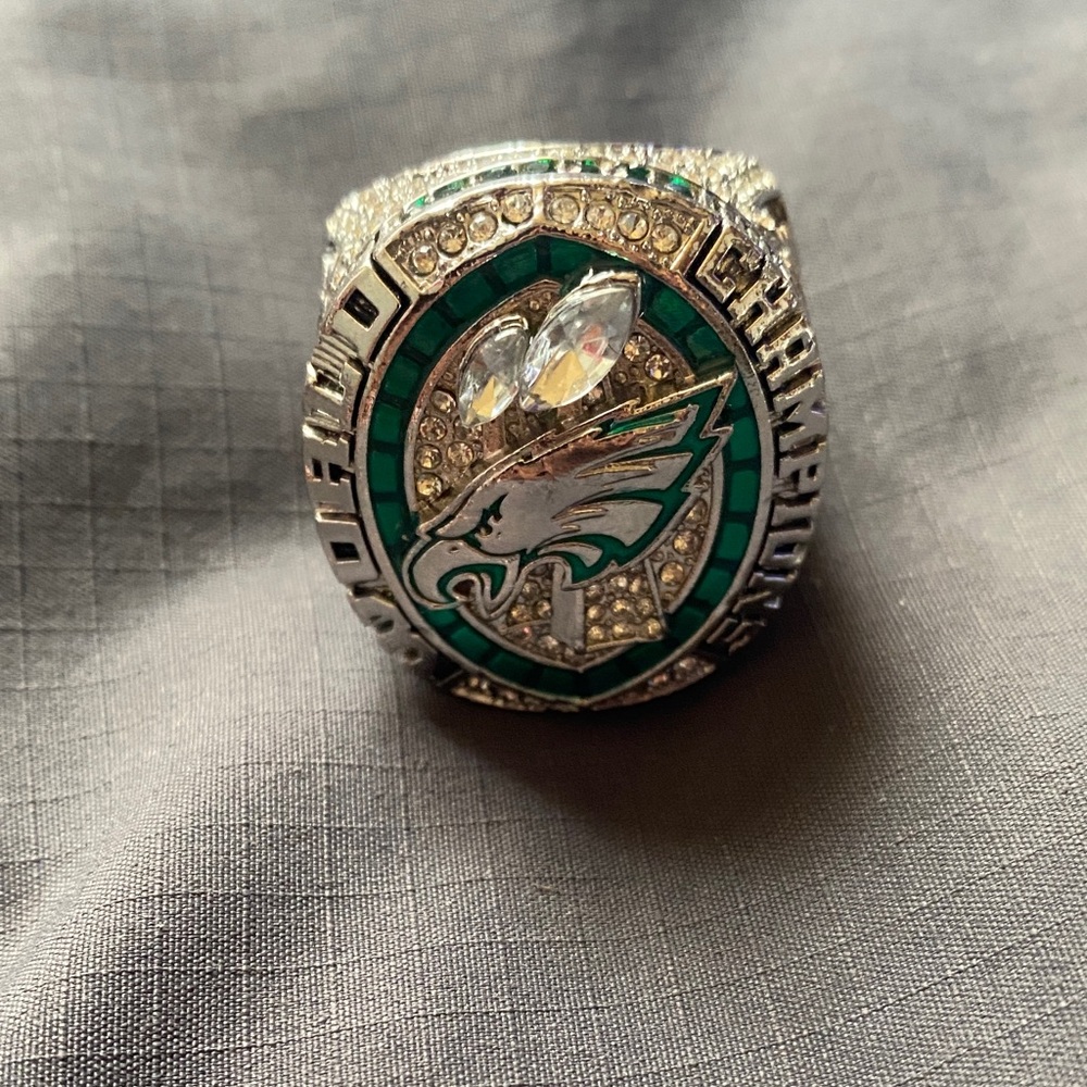Silver and Green Championship Ring